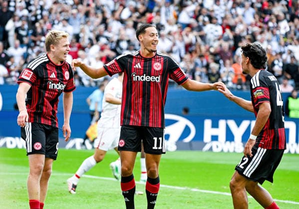 September 19, 2026, xpsx, Soccer, Bundesliga 1, Eintracht Frankfurt vs. SC Freiburg—celebrating the goal, goal celebration for the 1–0 goal scored by Younes Ebnoutalib of Eintracht Frankfurt, Jonathan Jonny Burkardt, Eintracht Frankfurt; Can Uzun, Eintracht Frankfurt. DFL and DFB regulations prohibit any use of photographs as image sequences and or quasi-video. Eintracht Frankfurt
