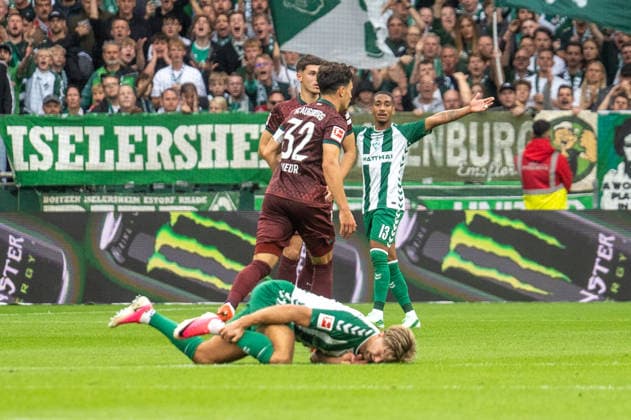 German Soccer Bundesliga 1, Matchday 4, 2026–2027, Werder Bremen vs. FC Augsburg on September 19, 2026, at the Weserstadion in Bremen; Niclas Füllkrug of Werder Bremen, No. 10, is on the ground after a tackle with Fabian Rieder of FC Augsburg, No. 32 Copyright: xSvenxHeidmannx