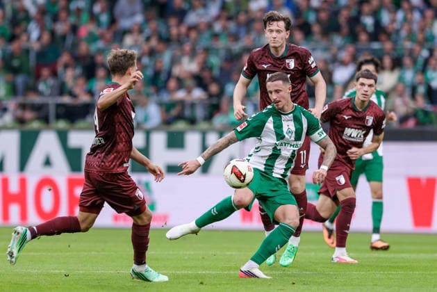 From left: Robin Fellhauer (FC Augsburg, 19), Marco Friedl (SV Werder Bremen, 32) with the ball; single frame; full body; action; game scene; Michael Gregoritsch (FC Augsburg, 11), DFL REGULATIONS PROHIBIT ANY USE OF PHOTOGRAPHS AS SEQUENCES AND OR VIDEO-LIKE PHOTO SERIES DFL REGULATIONS PROHIBIT ANY USE OF PHOTOGRAPHS AS IMAGE SEQUENCES AND OR VIDEO-LIKE PHOTO SERIES, September 19, 2026, Bremen, Germany, soccer, Bundesliga, SV Werder Bremen, FC Augsburg xobx