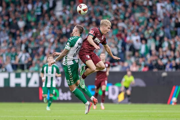 From left: Marco Friedl (SV Werder Bremen), 32, and Hennes Behrens (FC Augsburg), 16, in a header duel; header; tackle; action; game scene; DFL REGULATIONS PROHIBIT ANY USE OF PHOTOGRAPHS AS SEQUENCE IMAGES AND OR VIDEO-LIKE PHOTO SERIES DFL REGULATIONS PROHIBIT ANY USE OF PHOTOGRAPHS AS IMAGE SEQUENCES AND OR QUASI-VIDEO, September 19, 2026, Bremen, Germany, soccer, Bundesliga, SV Werder Bremen vs. FC Augsburg xobx