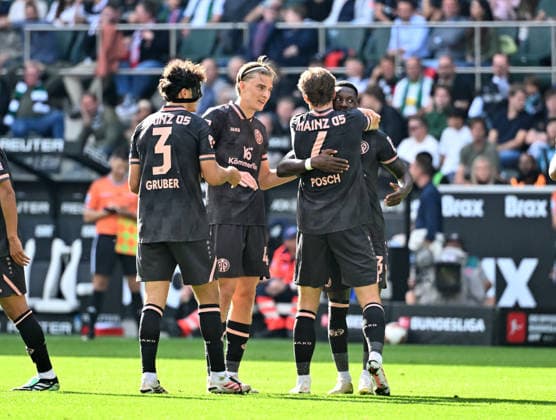 September 19, 2026, Mönchengladbach Soccer, Men s, 2026–2027 Season, Borussia Mönchengladbach vs. 1. FSV Mainz 05: Mainz fans celebrate after the goal that made it 1–2 (far right); goal scorer Sheraldo Becker (Mainz). DFL regulations prohibit any use of photographs as image sequences and or quasi-video content. Borussia Park, North Rhine-Westphalia, Germany