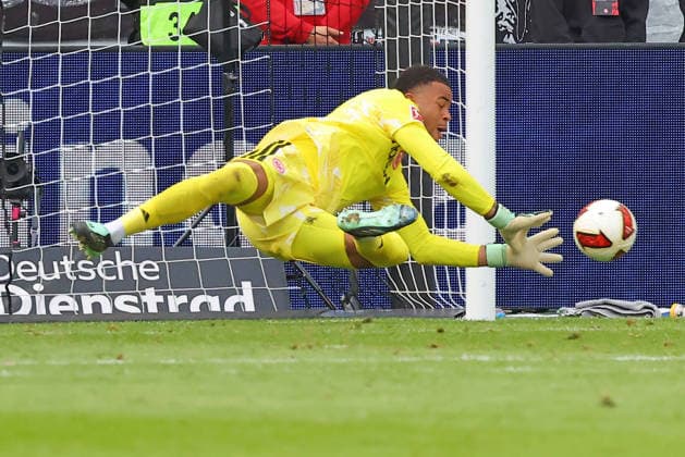 Frankfurt, Germany, September 19, 2026, Bundesliga 1, 2026–2027, Matchday 4: Eintracht Frankfurt vs. SC Freiburg. Pictured: Frankfurt goalkeeper Noah Atubolu making a spectacular save. DFL and DFB regulations prohibit any use of photographs as image sequences and or quasi-video. Deutsche Bank Park, Hesse Copyright: xFotostandx xRacochax