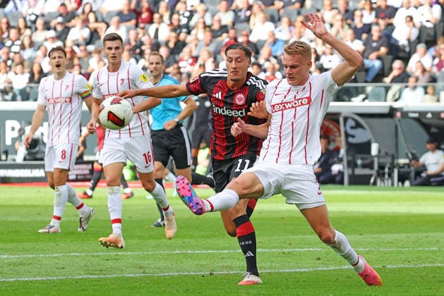 Frankfurt, Germany September 19, 2026 Bundesliga 2026–2027, Matchday 4: Eintracht Frankfurt vs. SC Freiburg. Pictured, from left, in a tackle: Younes Ebnoutalib (Frankfurt) vs. Philipp Lienhart (SCF). DFL and DFB regulations prohibit any use of photographs as image sequences and or quasi-video. Deutsche Bank Park, Hesse Copyright: xFotostandx xRacochax