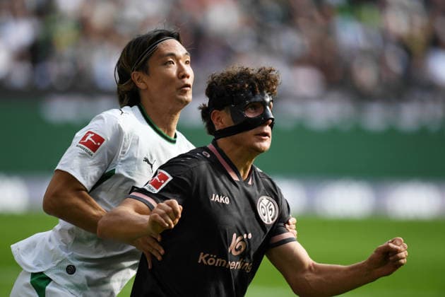 September 19, 2026, xophax, Soccer, Bundesliga 1, DFL: Borussia Mönchengladbach vs. 1. FSV Mainz 05. From left to right: Kou Itakura (Mönchengladbach) and Fabio Gruber (Mainz 05). DFL and DFB regulations prohibit any use of photographs as image sequences and or QUASI-VIDEO Mönchengladbach
