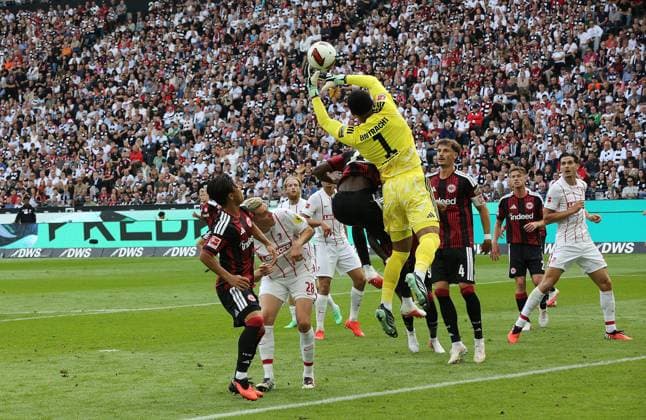 September 19, 2026 xmgoodx Frankfurt am Main, Deutsche Bank Park Bundesliga Season 2026–2027 Eintracht Frankfurt vs. SC Freiburg Noel Aseko 15, Eintracht Frankfurt and goalkeeper Noah Atubolu 1, Eintracht Frankfurt jump high DFL DFB REGULATIONS PROHIBIT ANY USE OF PHOTOGRAPHS AS IMAGE SEQUENCES AND OR QUASI-VIDEO