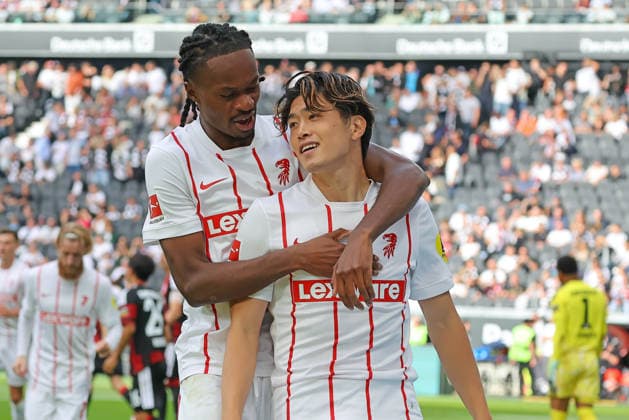 Frankfurt, Germany September 19, 2026 Bundesliga 2026–2027, Matchday 4: Eintracht Frankfurt vs. SC Freiburg Pictured: Jordy Makengo (SCF) and goal scorer Yuito Suzuki (SCF) celebrate the goal that tied the game at 2–2. DFL and DFB regulations prohibit any use of photographs as image sequences and or quasi-video. Deutsche Bank Park, Hesse Copyright: xFotostandx xRacochax