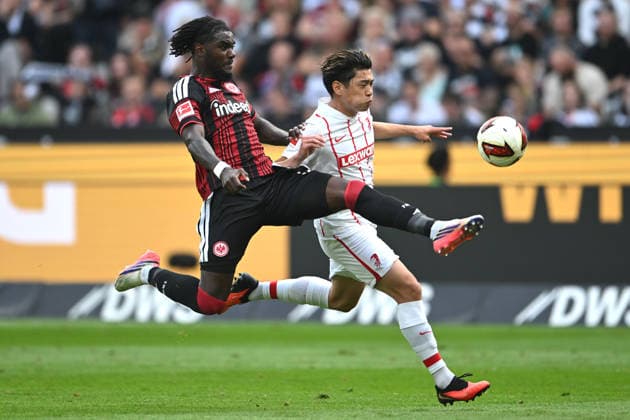 Soccer, Bundesliga 1, Matchday 4: Eintracht Frankfurt vs. SC Freiburg on September 19, 2026, at Deutsche Bank Park in Frankfurt. Lilian Brassier (Frankfurt, front) and Yuito Suzuki (Freiburg, back). DFL regulations prohibit any use of photographs as image sequences and or quasi-video. xJKx