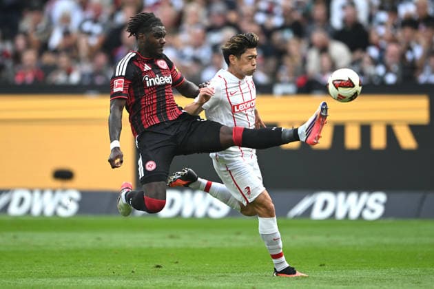 Soccer, Bundesliga 1, Matchday 4: Eintracht Frankfurt vs. SC Freiburg on September 19, 2026, at Deutsche Bank Park in Frankfurt. Lilian Brassier (Frankfurt, front) and Yuito Suzuki (Freiburg, back). DFL regulations prohibit any use of photographs as image sequences and or quasi-video. xJKx