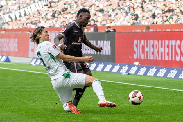 Tackle between Ko Itakura (Borussia Mönchengladbach, 06) and Sheraldo Becker (1. FSV Mainz 05, 23) – Borussia Mönchengladbach vs. 1. FSV Mainz 05, Soccer, Bundesliga, Matchday 4, 2026–2027 season, September 19, 2026. DFL and DFB regulations prohibit any use of photographs as image sequences and or quasi-video. Borussia Mönchengladbach vs. 1. FSV Mainz 05, soccer, Bundesliga 1, Matchday 4, 2026–2027 season, September 19, 2026, Mönchengladbach Copyright: xEibner-Pressefoto ThomasxHaeslerx EP_THR