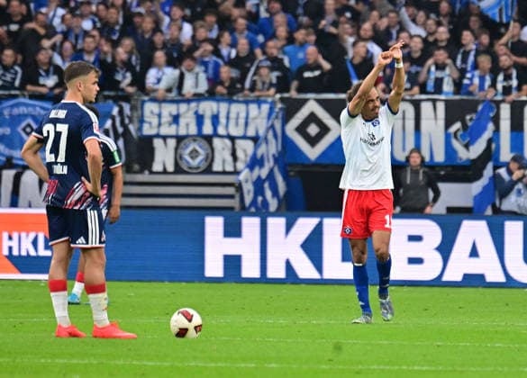 September 19, 2026, German Soccer, Men s, 1st Division, Matchday 4, 2026–2027 Season, Hamburg, Hamburger SV vs. 1. FC Köln: Yussuf Poulsen (HSV, No. 15) scores the goal to make it 2–0 for Hamburg and celebrates with the fans. DFB and DFL regulations prohibit any use of photographs as image sequences and or quasi-video. Hamburg Volksparkstadion, Hamburg, Germany Copyright: xnordphotoxGmbH xWitkex