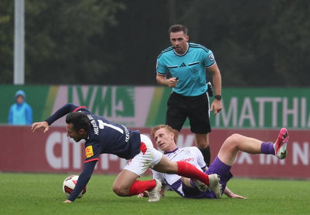 Match between Steven Skrzybski (Holstein Kiel) and Leon Opitz (VfL Osnabrück) – Soccer, Men s, 2026–2027 Season, 2. Bundesliga, Holstein Stadium, Holstein Kiel vs. VfL Osnabrück, 1–1. DFL regulations prohibit any use of photographs as image sequences and or quasi-video.