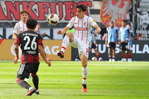 Frankfurt, Germany, September 19, 2026, Bundesliga 1, 2026–2027 Season, Matchday 4: Eintracht Frankfurt vs. SC Freiburg. Pictured, from left, in a tackle: Keita Kosugi (Frankfurt) vs. Yuito Suzuki (SCF). DFL and DFB regulations prohibit any use of photographs as image sequences and or quasi-video. Deutsche Bank Park, Hesse Copyright: xFotostandx xRacochax