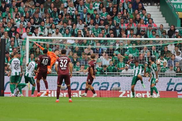 September 26, 2019, Germany, Soccer, Men s 1st Division, Matchday 4, 2026–2027 Season, SV Werder Bremen vs. FC Augsburg Goal to make it 0–2 Scorer: Calvin Brackelmann of FC Augsburg 02 scores to make it 0–2 past goalkeeper Karl Hein of SV Werder Bremen 01 at the Weserstadion in Bremen, Germany Copyright: xnordphotoxGmbHx xTauchnitzx