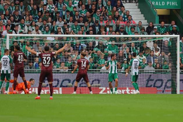 September 26, 2019, Germany, Soccer, Men s 1st Division, Matchday 4, 2026–2027 Season, SV Werder Bremen vs. FC Augsburg Goal to make it 0–2 Scorer: Calvin Brackelmann of FC Augsburg 02 scores to make it 0–2 past goalkeeper Karl Hein of SV Werder Bremen 01 at the Weserstadion in Bremen, Germany Copyright: xnordphotoxGmbHx xTauchnitzx