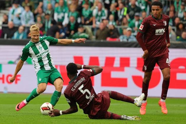September 26, 2019, GER, Soccer, Men s 1st Bundesliga, Matchday 4, 2026–2027 Season, SV Werder Bremen vs. FC Augsburg Goal to make it 1–2 Scorer: Marco Grüll (SV Werder Bremen) 17 scores the goal to make it 1–2 after dribbling past Chrislain Matsima (FC Augsburg 05) at the Weserstadion in Bremen, Germany Copyright: xnordphotoxGmbHx xTauchnitzx