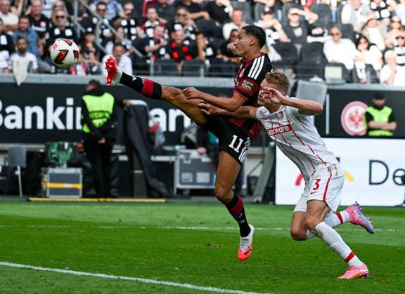 September 19, 2026, xpsx, Soccer, Bundesliga 1, Eintracht Frankfurt vs. SC Freiburg: Younes Ebnoutalib (Eintracht Frankfurt) and Philipp Lienhart (SC Freiburg). DFL and DFB regulations prohibit any use of photographs as image sequences and or quasi-video. Eintracht Frankfurt