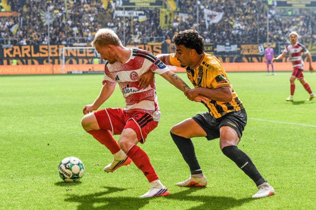 v li Jomaine Consbruch, Fortuna Düsseldorf, 14; Mehdi Loune, Alemannia Aachen, 10; tackle, duel, tackle, tackling, dynamic, action, 09 19 2026, Aachen, Germany; soccer, 3rd Division, TSV Alemannia Aachen vs. Fortuna Düsseldorf, soccer, 3rd Division, TSV Alemannia Aachen vs. Fortuna Düsseldorf, DFB and DFL regulations prohibit any use of photographs as image sequences and or quasi-video xmhx
