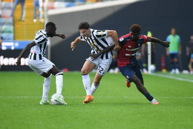 SOCCER - Serie A - Udinese Calcio vs. Cagliari Calcio Photo by IPA ABACAPRESS.COM88712850 - Udinese s Hassane Kamara and Udinese s Jurgen Ekkelenkamp are blocked by Cagliari s Michel Ndary Adopo during the Serie A soccer match between Udinese Calcio and Cagliari Calcio in Udine, Italy, on September 19, 2026 Udine Italy  Copyright: xIPAxSport ABACAx