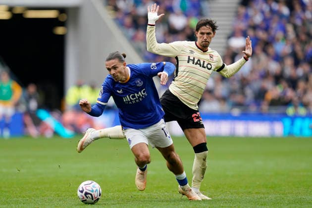 Liverpool, England, 19th September 2026. Jack Grealish of Everton and Exequiel Palacios of Ipswich Town challenge for the ball during the Everton vs Ipswich Town Premier League match at Hill Dickinson Stadium, Liverpool. Picture credit should read: Andrew Yates Sportimage EDITORIAL USE ONLY. No use with unauthorised audio, video, data, fixture lists, club league logos or live services. Online in-match use limited to 120 images, no video emulation. No use in betting, games or single club league player publications. SPI_050_AY_Everton_Ipswich SPI-5008-0054