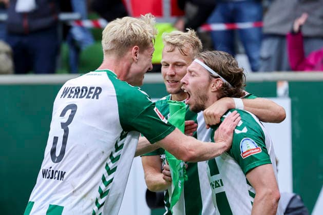 Mitchell Weiser of Werder Bremen celebrates his goal to make it 3–2 with Marco Gruell of Werder Bremen and Oskar Wojcik of Werder Bremen during the Bundesliga 1 match between SV Werder Bremen and FC Augsburg at the Weserstadion on September 19, 2026, in Bremen, Germany. Photo by Marco Steinbrenner, DeFodi Images. Mitchell Weiser of Werder Bremen celebrates after scoring his team’s third goal with Marco Gruell of Werder Bremen and Oskar Wojcik of Werder Bremen during the Bundesliga match between SV Werder Bremen and FC Augsburg at Weserstadion on September 19, 2026 in Bremen, Germany. Photo by Marco Steinbrenner, DeFodi Images. DFB and DFL regulations prohibit any use of photographs as image sequences and or quasi-video. Photo by Marco Steinbrenner, DeFodi Images.