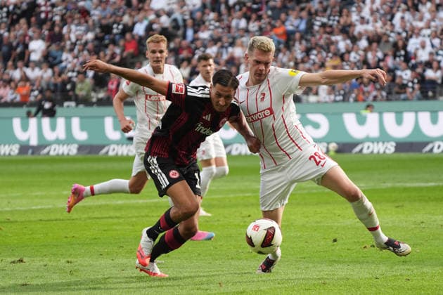 Younes Ebnoutalib (Eintracht Frankfurt) vs. Matthias Ginter (SC Freiburg), September 28, 2026, Bundesliga, 2026–27 season, Eintracht Frankfurt vs. SC Freiburg, Deutsche Bank Park, Matchday 4