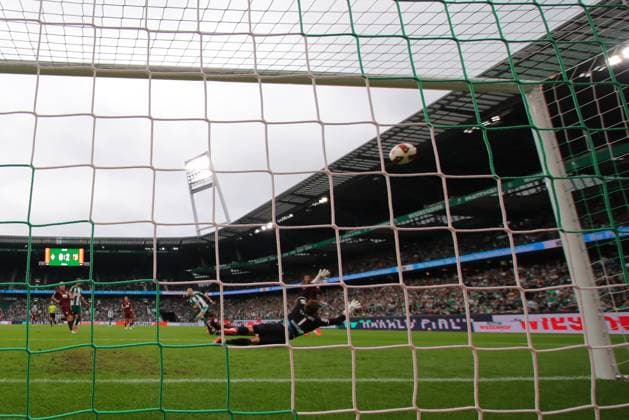 September 26, 2019, Germany, Soccer, Men s 1st Division, Matchday 4, 2026–2027 Season, SV Werder Bremen vs. FC Augsburg Goal to make it 1–2 Scorer: Marco Grüll (SV Werder Bremen) scores the 1–2 goal past goalkeeper Finn Dahmen (FC Augsburg 01), filmed with the behind-the-goal remote camera at Weserstadion in Bremen, Germany Copyright: xnordphotoxGmbHx xTauchnitzx