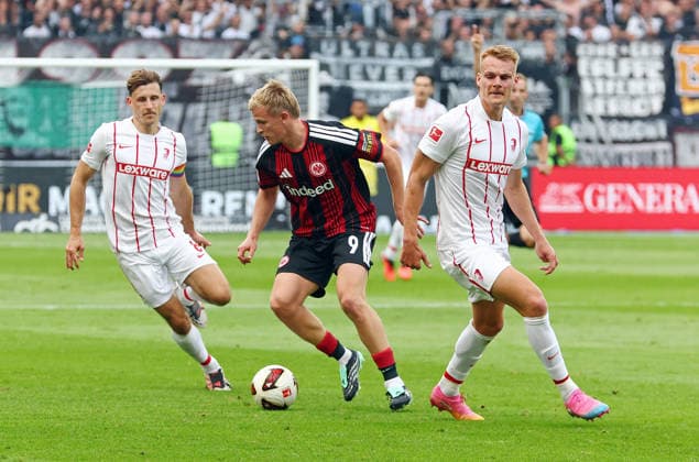 September 19, 2026, xovx, Soccer, Bundesliga, Eintracht Frankfurt vs. SC Freiburg, Maximilian Eggestein (SC Freiburg), Jonathan Burkardt, Eintracht Frankfurt, Philipp Lienhart, SC Freiburg; DFL and DFB regulations prohibit any use of photographs as image sequences and or quasi-video; Eintracht Frankfurt