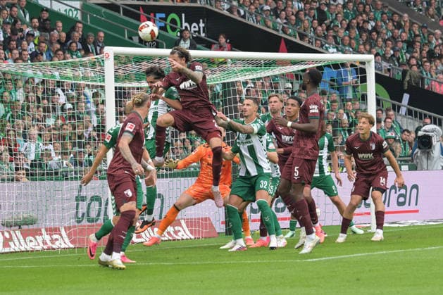 Calvin Brackelmann of FC Augsburg 2 scores the 0-2 goal; SV Werder Bremen vs. FC Augsburg; soccer; Bundesliga; DFL; September 19, 2026. DFB regulations prohibit any use of photographs as image sequences and or quasi-video. Bremen, Germany Copyright: xkolbert-press BurghardxSchreyerx