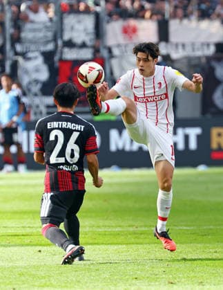 September 19, 2026, xovx, Soccer, Bundesliga, Eintracht Frankfurt vs. SC Freiburg, L. Keita Kosugi (Eintracht Frankfurt), Quito Suzuki (SC Freiburg). DFL and DFB regulations prohibit any use of photographs as image sequences and or quasi-video by Eintracht Frankfurt.