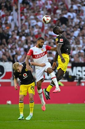 Heading duel, tackle, action: Serhou Guirassy (Borussia Dortmund, BVB 09) vs. Josha Vagnoman (VfB Stuttgart 04), Daniel Svensson (Borussia Dortmund, BVB 24), VfB Stuttgart vs. Borussia Dortmund (BVB 19), September 9, 2026. DFL regulations prohibit any USE OF PHOTOGRAPHS AS IMAGE SEQUENCES AND OR QUASI-VIDEO VfB Stuttgart vs. Borussia Dortmund BVB