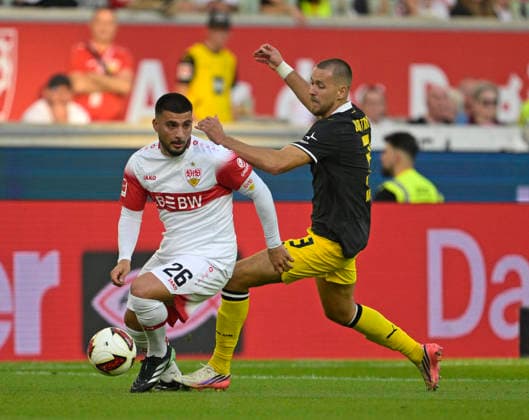 September 19, 2026, Soccer, Bundesliga 1, 2026–2027, Matchday 4, VfB Stuttgart vs. Borussia Dortmund, at the MHP Arena in Stuttgart, from left: Deniz Undav (Stuttgart) vs. Waldemar Anton (Borussia Dortmund)