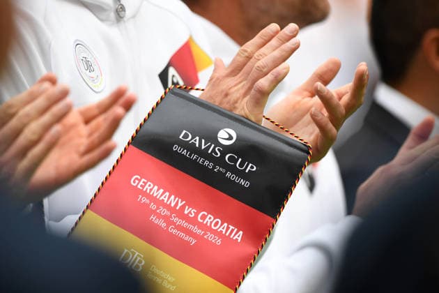 Hands holding the German flag, feature, background image, symbolic photo, match1 Alexander ZVEREV GER Matej DODIC CRO Germany GER Croatia CRO Tennis Davis Cup Qualifiers Round 2 on September 19, 2026, at the Heristo Arena Halle Westfalen, Germany Â