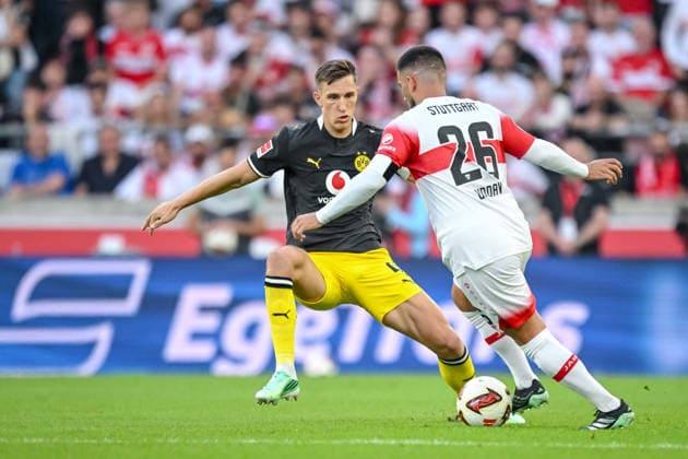 Nico Schlotterbeck of Borussia Dortmund and Deniz Undav of VfB Stuttgart battle for the ball during the Bundesliga match between VfB Stuttgart and Borussia Dortmund, MHPArena on September 19, 2026, in Stuttgart, Germany. Photo by Harry Langer, DeFodi Images. Nico Schlotterbeck of Borussia Dortmund and Deniz Undav of VfB Stuttgart battle for the ball during the Bundesliga match between VfB Stuttgart and Borussia Dortmund at MHPArena on September 19, 2026, in Stuttgart, Germany. Photo by Harry Langer, DeFodi Images. DFB and DFL regulations prohibit any use of photographs as image sequences and or quasi-video. Photo by Harry Langer, DeFodi Images. DFB and DFL regulations prohibit any use of photographs as imSEQUENCES AND OR QUASI-VIDEO