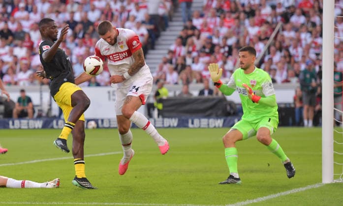 September 19, 2026, xblx, Soccer, Bundesliga 1, VfB Stuttgart vs. Borussia Dortmund: Serhou Guirassy (Borussia Dortmund), Jeff Chabot (VfB Stuttgart), Fabian Bredlow (VfB Stuttgart). DFL and DFB regulations prohibit any use of photographs as image sequences and or quasi-video. Stuttgart