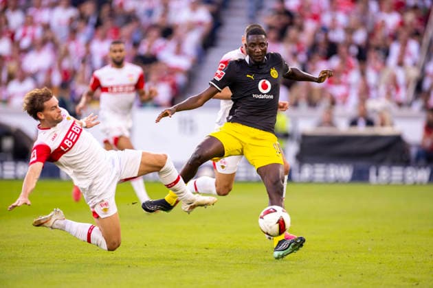 September 19, 2026, Soccer, Matchday 4 of the 1. Bundesliga, VfB Stuttgart vs. Borussia Dortmund; Maximilian Mittelstädt (VfB Stuttgart), Serhou Guirassy (Borussia Dortmund); Stuttgart, MHP Arena, Baden-Württemberg, Germany; xRHR PHOTO DEx Copyright: DennisxEwert RHR-FOTOx RHR-FOTO DE