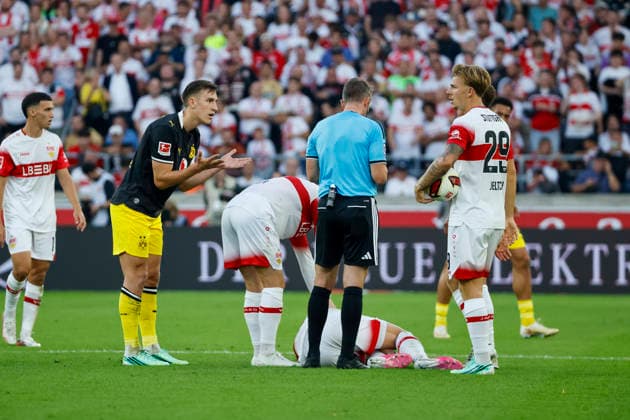 Ermedin Demirovic, VfB Stuttgart, No. 09, injured on the ground, Germany, soccer, Bundesliga 1, Matchday 4, 2026–2027, VfB Stuttgart vs. Borussia Dortmund, September 19, 2026, Stuttgart MHP Arena, Germany Copyright: xGrantxHubbsx