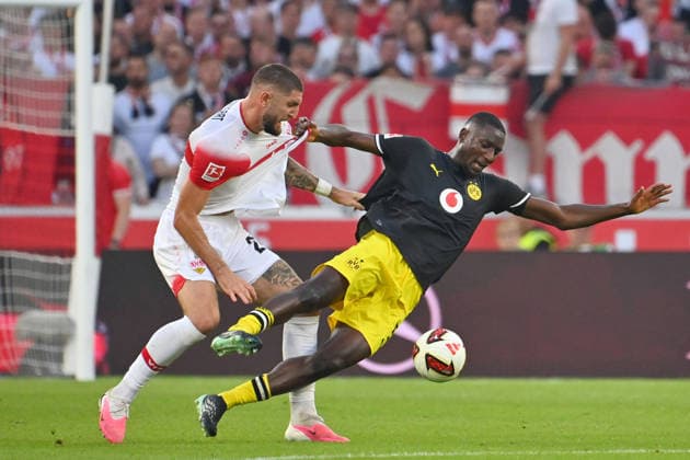 Jeff CHABOT, VfB Stuttgart, Action, Tackle against Serhou GUIRASSY, DO Soccer, Bundesliga, 2026–2027 Season, Matchday 4, VfB Stuttgart vs. Borussia Dortmund on September 19, 2026, MHP ARENA