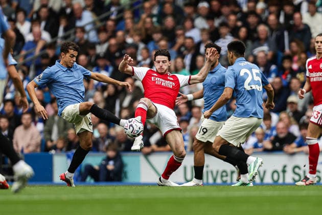 19th September 2026; American Express Stadium, Brighton, England; Premier League Football, Brighton and Hove Albion versus Arsenal; Declan Rice of Arsenal is closed down by Brighton players AndyxSkinner