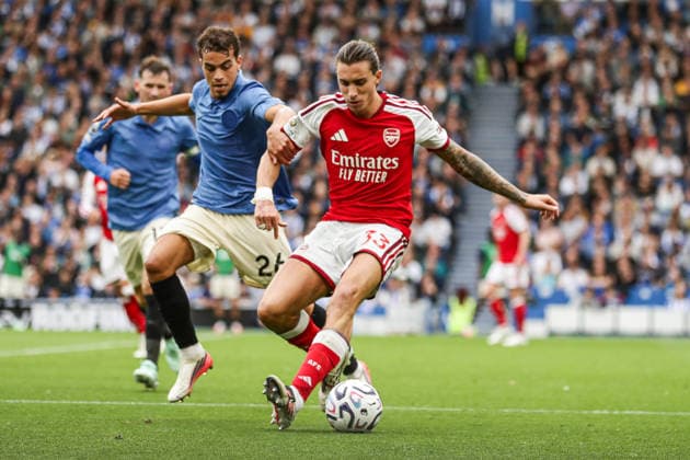 19th September 2026; American Express Stadium, Brighton, England; Premier League Football, Brighton and Hove Albion versus Arsenal; Riccardo Calafiori of Arsenal and Yasin Ayari of Brighton and Hove Albion AndyxSkinner