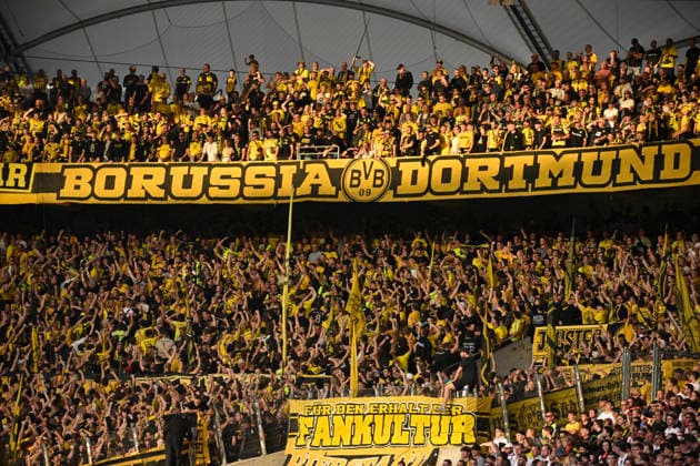 Fan section, fans, fan stand, flags, banners, atmosphere, lively Borussia Dortmund BVB VfB Stuttgart vs. Borussia Dortmund BVB September 19, 2026 DFL regulations prohibit any use of photographs as image sequences and or quasi-video VfB Stuttgart vs. Borussia Dortmund BVB