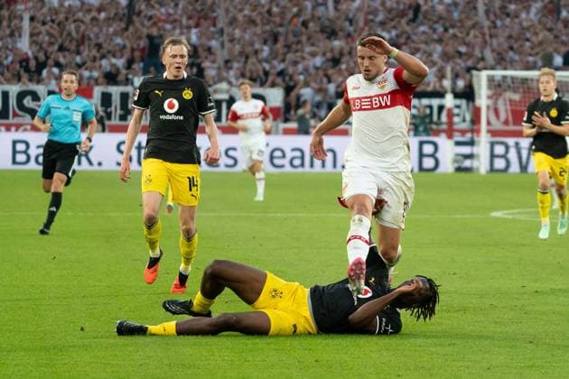 Tackle: Ermedin Demirovic (VfB Stuttgart), 09, Joane Gadou (Borussia Dortmund), 22, GER, VfB Stuttgart vs. Borussia Dortmund, Soccer, Bundesliga 1, Matchday 4, 2026–2027 Season, September 19, 2026, DFL regulations prohibit any use of photographs as image sequences and or quasi-video, GER, VfB Stuttgart vs. Borussia Dortmund, Soccer, Bundesliga 1, Matchday 4, 2026–2027 Season, September 19, 2026, Stuttgart Copyright: xEibner-Pressefoto EdwardxCheungx EP_ECG
