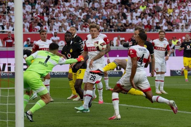 September 19, 2026: Soccer – VfB Stuttgart vs. Borussia Dortmund, Matchday 4 of the Bundesliga 1 at the MHP Arena; Fabian Bredlow (VfB Stuttgart) makes a fist save; 1 after a corner IMPORTANT NOTE: In accordance with DFL and DFB regulations, it is prohibited to use or allow the use of photographs taken in the stadium and or during the game in the form of sequential images and or video-like photo series. Copyright: xJamesxZabelx