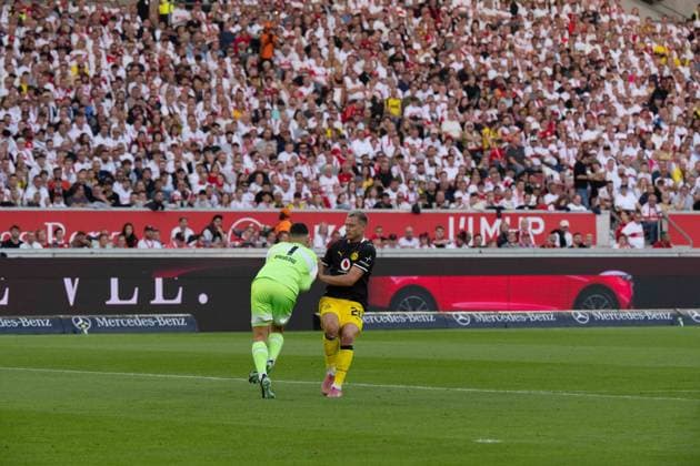 September 19, 2026: Soccer – VfB Stuttgart vs. Borussia Dortmund, Matchday 4 of the Bundesliga 1 at the MHP Arena; Fabian Bredlow (VfB Stuttgart), 1 VS Julian Ryerson, Borussia Dortmund, 26 IMPORTANT NOTICE: In accordance with DFL and DFB regulations, it is prohibited to use or allow the use of photographs taken in the stadium and or during the game in the form of sequential images and or video-like photo series. Copyright: xJamesxZabelx
