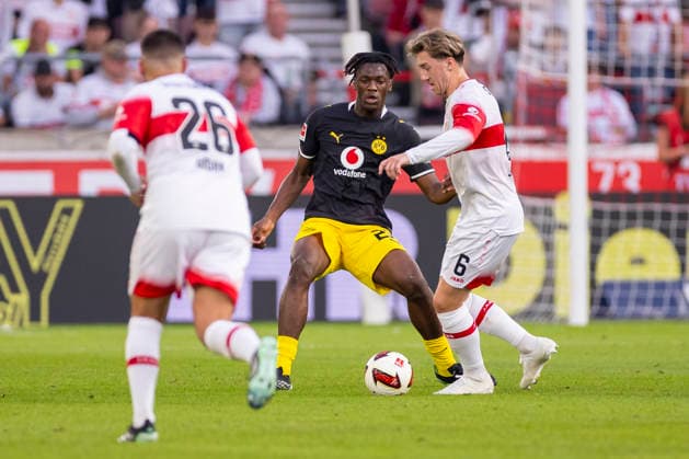 September 19, 2026, Soccer, Matchday 4 of the 1st Bundesliga, VfB Stuttgart vs. Borussia Dortmund, Joane Gadou (Borussia Dortmund), Angelo Stiller (VfB Stuttgart), Stuttgart MHP Arena, Baden-Württemberg, Germany, xRHR PHOTO DEx Copyright: DennisxEwert RHR-FOTOx RHR-FOTO DE