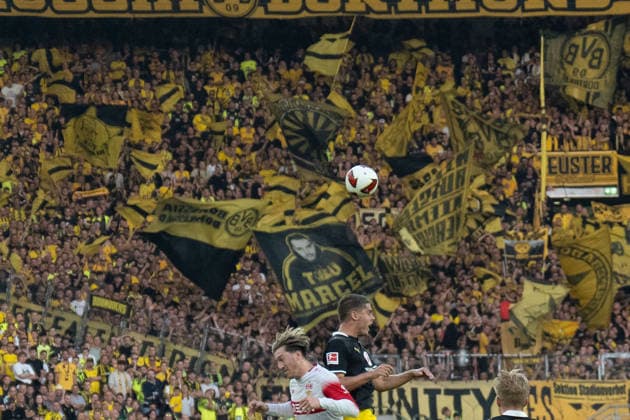 September 19, 2026: Soccer – VfB Stuttgart vs. Borussia Dortmund, Matchday 4 of the Bundesliga at the MHP Arena. Heading duel: Ethan Nwaneri (Borussia Dortmund, No. 18) vs. Angelo Stiller (VfB Stuttgart), 6 IMPORTANT NOTICE: In accordance with DFL and DFB regulations, it is prohibited to use or allow the use of photographs taken in the stadium and or during the game in the form of sequential images and or video-like photo series. Copyright: xJamesxZabelx