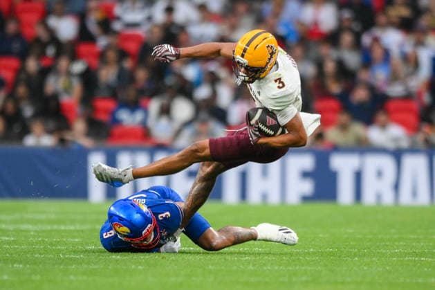 Kansas Jayhawks v Arizona State Sun Devils Union Jack Classic Corey Gordon, Safety of Kansas Jayhawks tackles Reed Harris, Wide Receiver of Arizona State Sun Devils during the Union Jack Classic match at Wembley Stadium, London 19 09 2026 UK Newspapers OUT Copyright: xMalcolmxFellx FIL-23969-0025