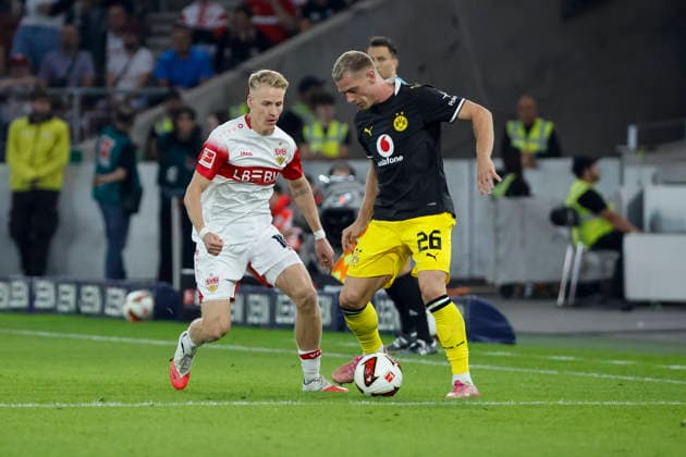 Chris Führich (VfB Stuttgart, 10) and Julian Ryerson (BVB Dortmund, 26) battling for the ball, Germany, soccer, Bundesliga 1, Matchday 4, 2026–2027, VfB Stuttgart vs. Borussia Dortmund, September 19, 2026, Stuttgart MHP Arena, Germany Copyright: xGrantxHubbsx