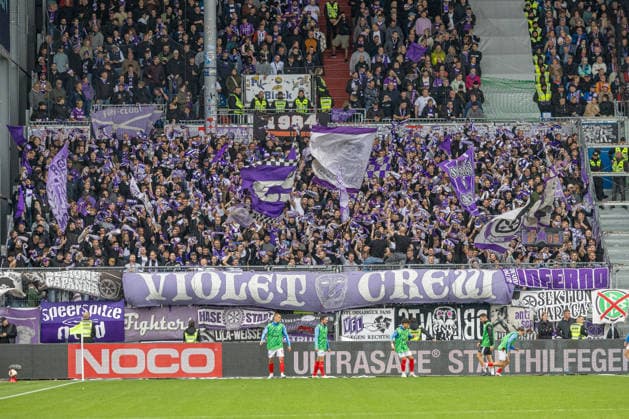September 19, 2026 Soccer: 2. Bundesliga Men s Season 2026–2027, Matchday 6: Holstein Kiel vs. VFL Osnabrück; Kiel in blue and white, Osnabrück in white and purple; VFL Osnabrück away fan section in Kiel at Kiel Holstein Stadium, Westring 501, Schleswig-Holstein, Germany
