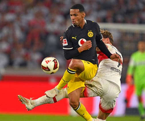 September 19, 2026, Soccer, Bundesliga 1, 2026–2027, Matchday 4, VfB Stuttgart vs. Borussia Dortmund, at the MHP Arena in Stuttgart, from left: Ethan Nwaneri (Borussia Dortmund) vs. Maximilian Mittelstädt (Stuttgart)