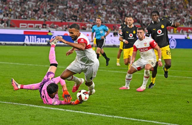 September 19, 2026, Soccer, Bundesliga 1, 2026–2027 Season, Matchday 4, VfB Stuttgart vs. Borussia Dortmund, at the MHP Arena in Stuttgart, Goalkeeper Gregor Kobel (Borussia Dortmund) vs. Josha Vagnoman (Stuttgart)